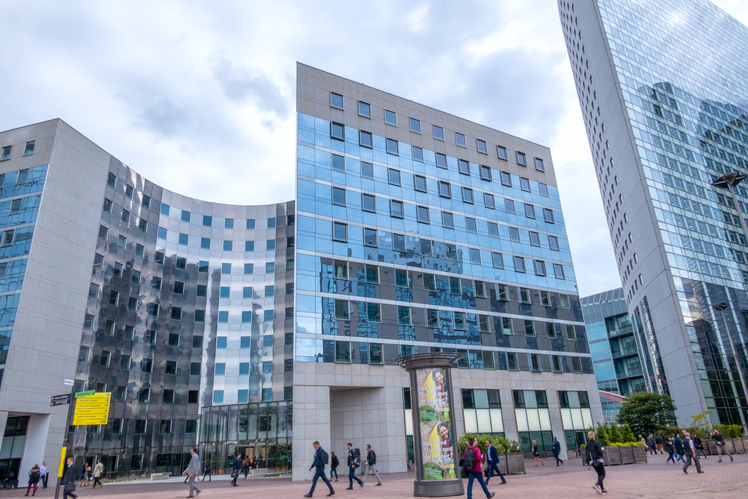 Modern Office Buildings in La Defense District of Paris and People